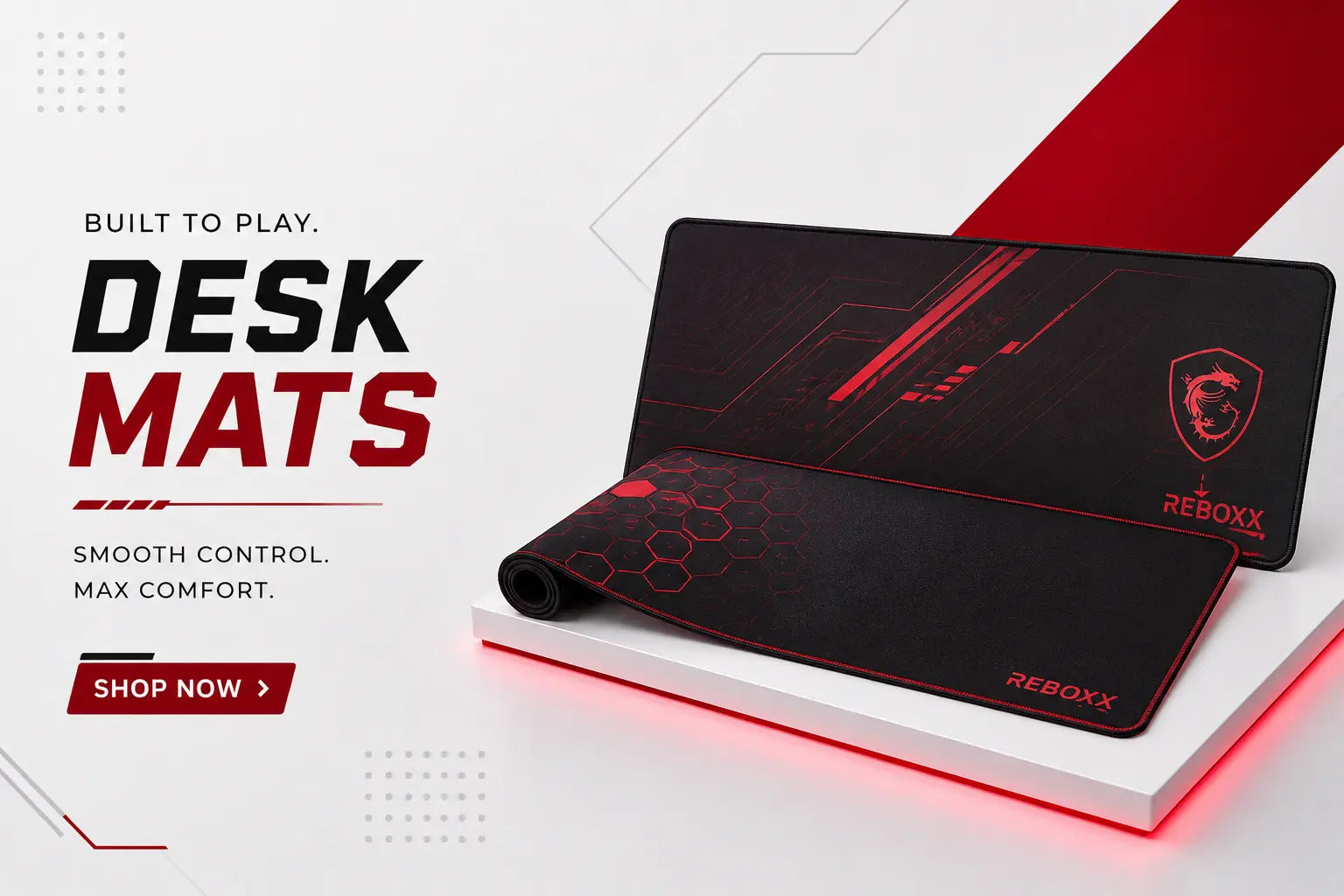 Reboxx desk mats category banner featuring a large gaming mouse pad with the text "Built to Play.", "Desk Mats", and "Shop Now".